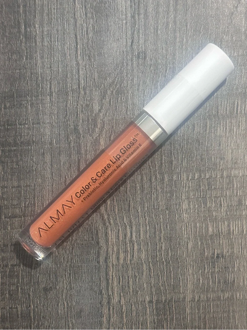 New Almay Color & Care Hydrating Lip Gloss in Glitters Gold, a Shimmery Nude